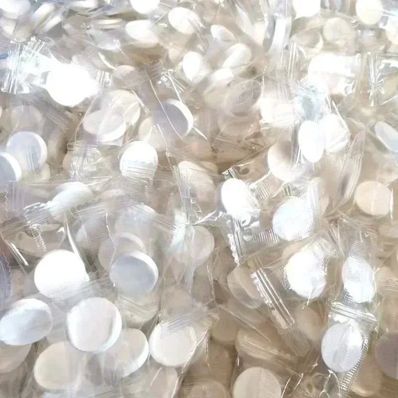 100pcs Disposable Compressed Facial Mask Portable Travel Non-woven Face Mask Skin Care Cotton Wrapped Masks Paper