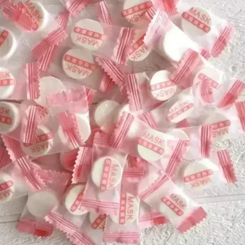 100pcs Disposable Compressed Facial Mask Portable Travel Non-woven Face Mask Skin Care Cotton Wrapped Masks Paper