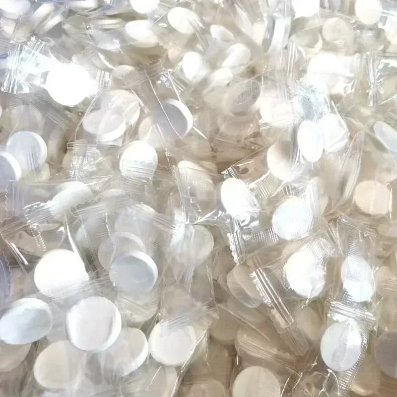 100pcs Disposable Compressed Facial Mask Portable Travel Non-woven Face Mask Skin Care Cotton Wrapped Masks Paper